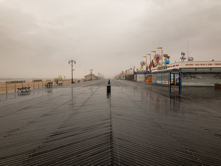 Brooklyn, New York - February 11, 2018: Boardwalk in Coney Island, Brooklyn on a foggy day.のeditorial素材