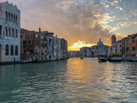 View along the Grand Canal in Venice, Italy at sunset.のeditorial素材