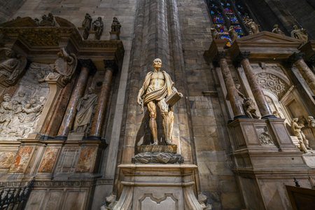 Milan, Italy - March 17, 2018: Statue of the skinned St. Bartholomew (wearing his own skin) in Milan Cathedral, Duomo di Milano, one of the largest churches in the world.の写真素材