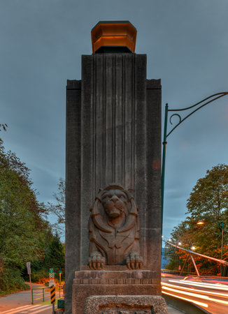 Lion monuments at the entrace to the Lions Gate Bridge in the evening in Vancouver, BC, Canadaのeditorial素材