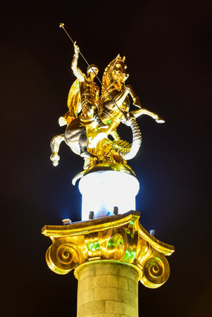 Golden statue of St. George on the main square of Tbilisi, capital city of Georgia.の写真素材