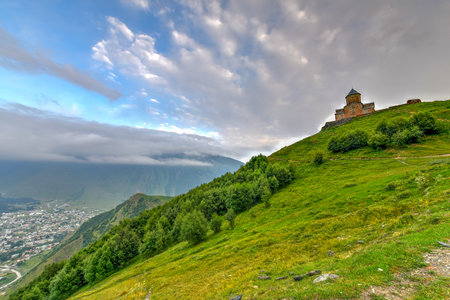 Gergeti Trinity Church (Tsminda Sameba), Holy Trinity Church near the village of Gergeti in Georgia,...