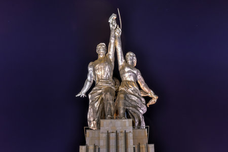 Moscow, Russia - July 22, 2019: Famous Soviet monument of the Worker and Kolkhoz Woman (Collective Farm Woman) by sculptor Vera Mukhina at night. Made of stainless steel in 1937.のeditorial素材