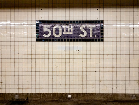 New York City - Nov 11, 2019: 50th Street New York City Subway station sign on 8th Avenue.のeditorial素材
