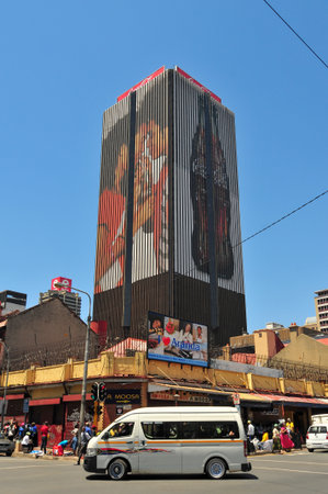 Johannesburg, South Africa - October 22, 2011: Central business district of Johannesburg with Coca-cola advertising on building.のeditorial素材