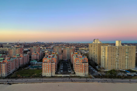 Sunset over Brighton Beach, Brooklyn looking at the Manhattan Skyline.の写真素材