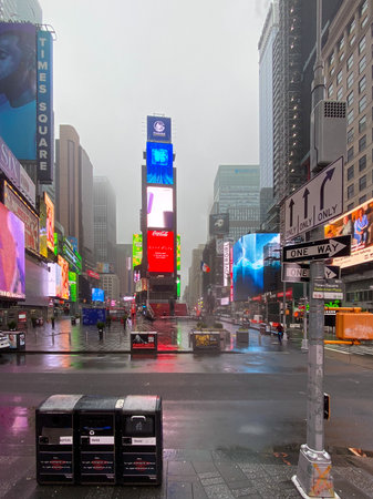 New York City - March 29, 2020: No crowds in Times Square after self-quarantine and social...