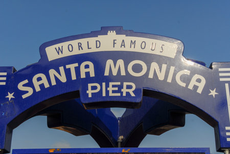 Los Angeles, California - May 15, 2007: Sign to the entrance of the World Famous Santa Monica Pier by Santa Monica Beach in Los Angeles, California, USA.のeditorial素材
