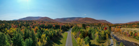 Colorful Hunter Mountain in upstate New York during peak fall foliage.