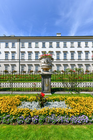 Classic view of famous Mirabell Gardens with historic Hohensalzburg Fortress in the background on a sunny day in fall in Salzburg, Austriaのeditorial素材