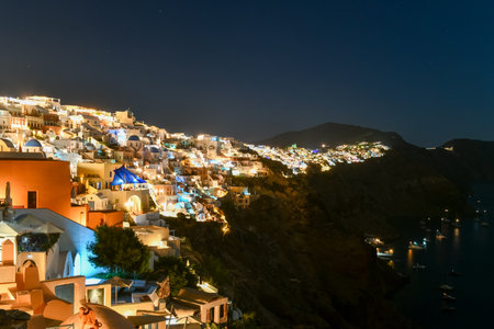 Classic Oia, Santorini skyline at night with buildings in Greece.の写真素材