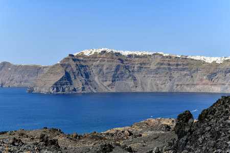 View of the island of Nea Kameni the volcano in the caldera of Santorini, Cyclades islands, Greece, Europeの写真素材
