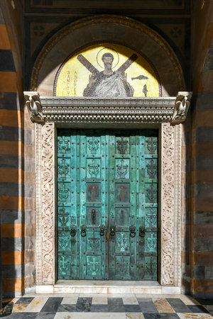 The door to the Apostle Saint Andrew, Roman Catholic church in Amalfi, Italy.のeditorial素材