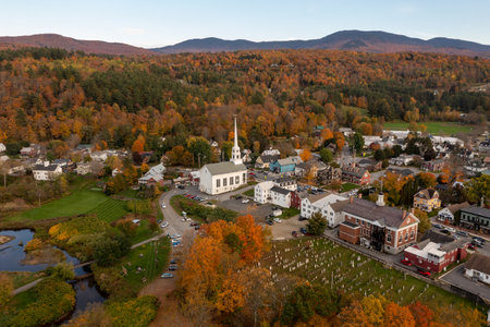 Stowe, Vermont - Oct 12, 2021: White Community Church in the famous ski town of Stowe in Vermont during the fall.のeditorial素材