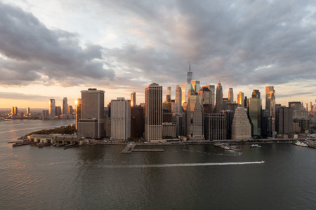 Aerial view of Manhattan in New York City from Brooklyn at sunset.のeditorial素材
