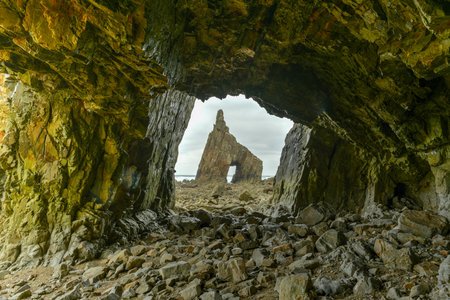 The Campiecho beach is located in Asturias, Spain on a cloudy day.の写真素材
