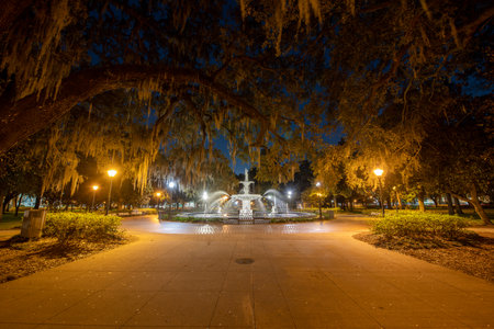 Illuminated Forsyth Park Fountain in Savannah, Georgia, USA in the evening.の写真素材