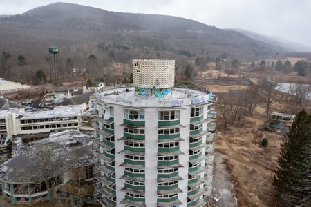 Wawarsing, New York - Mar 27, 2022: Ruins of the Nevele Grande Hotel, a high rise resort hotel located in Wawarsing, New York.のeditorial素材