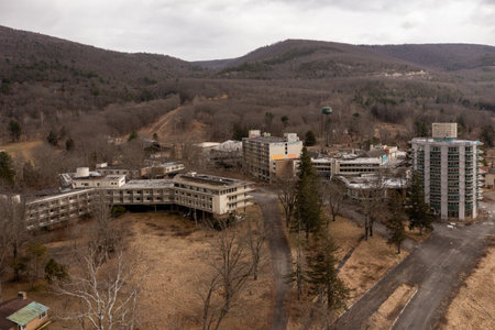 Wawarsing, New York - Mar 27, 2022: Ruins of the Nevele Grande Hotel, a high rise resort hotel located in Wawarsing, New York.のeditorial素材