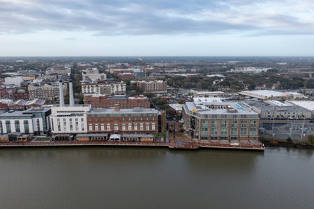 Aerial view of the Savannah city skyline on a sunny day. View along the Savannah River between downtown Savannah, Georgia, and Hutchinson Island.のeditorial素材