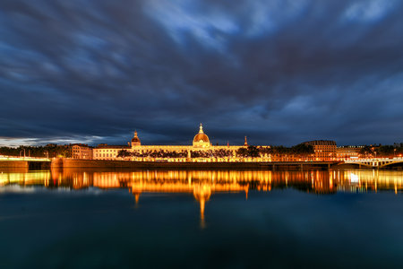 Le Grand Hotel Dieu - the Grand Hotel of Lyon, France at night. In 2019, a hotel opened in the renovated building.のeditorial素材