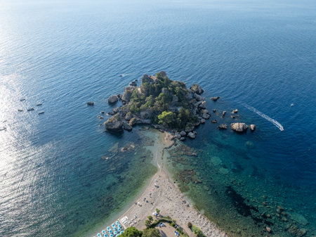 Aerial view of the beach and island Isola Bella at Taormina, Sicilyの写真素材