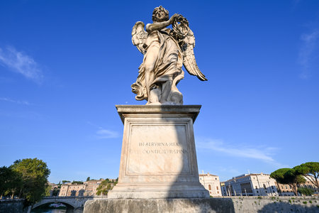 View of statue along Saint Angelo Bridge in Rome, Italyの写真素材