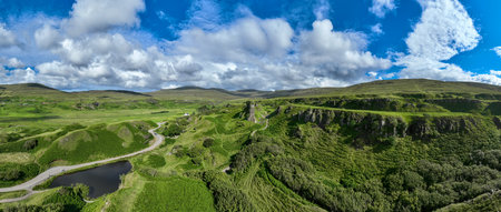 Aerial view of the rocks of Faerie Castle (Castle Ewen) at the Fairy Glen in Isle of Skye in...
