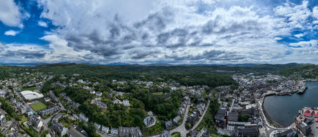 Aerial view of a tower overlooking a bay and an isle, Scotland.の写真素材