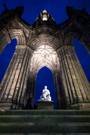 Edinburgh, UK - Jul 17, 2024: Scott Monument in Edinburgh, Scotland, United Kingdom at night. Built in honor of Sir Walter Scott.の写真素材
