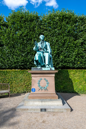 Copenhagen, Denmark - Jul 27, 2024: Statue of Hans Christian Andersen a danish writer of many fairy tales for children.の写真素材
