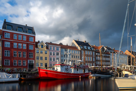 Copenhagen, Denmark - Jul 27, 2024: Nyhavn in Copenhagen in Denmark. The colourful houses of Nyhavn are one of the most iconic spots in Copenhagenの写真素材