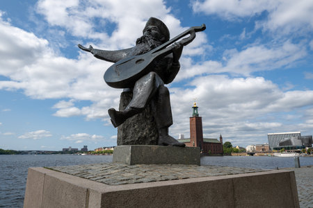 Stockholm, Sweden, Aug 2, 2024: Evert Taube Statue Sweden's much-loved balladeer, located on the water side of Riddarholmen in Stockholm, Sweden.の写真素材