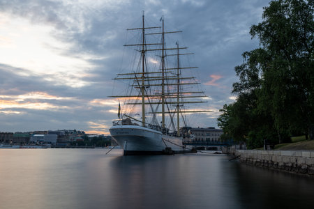 Stockholm, Sweden - Aug 4, 2024: The af Chapman (Dunboyne and the G.D. Kennedy) is a full-rigged steel ship moored on the western shore of the islet Skeppsholmen, now serving as a youth hostel.の写真素材