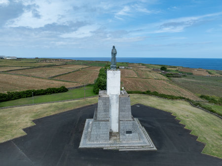 The Monumento do Imaculado Coracao de Maria in Praia da Vitoria, Terceira, Azores, is a religious landmark honoring the Immaculate Heart of Mary, offering cultural and spiritual significance.の写真素材