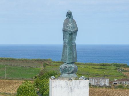 The Monumento do Imaculado Coracao de Maria in Praia da Vitoria, Terceira, Azores, is a religious landmark honoring the Immaculate Heart of Mary, offering cultural and spiritual significance.の写真素材