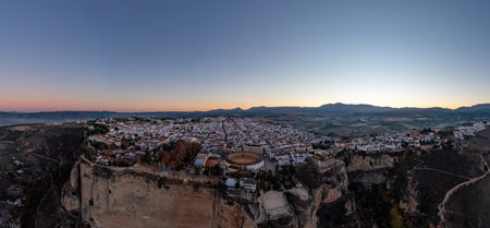 Bullring of the Royal Cavalry of Ronda aerial view at sunrise in Spain.の写真素材