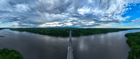 Aerial view of the Rip Van Winkle Bridge spanning the Hudson River between Catskill, NY and Hudson, NYの写真素材