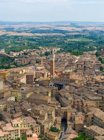 Aerial view of Siena, Italy, showcasing medieval architecture. The cityscape, from the 13th century, is framed by Tuscan landscapes.の写真素材