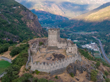 Aerial view of medieval Castello di Cly above Saint-Denis, Valle dâAosta, stone hilltop fortress dominating Dora Baltea valley landscape.の写真素材