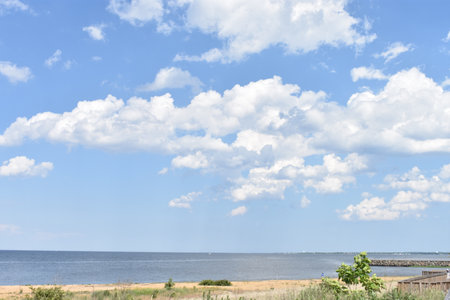 Beautiful seascape with blue sky and white cloudsの写真素材