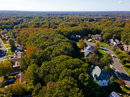 Aerial view of Autumn foliage colors in a section of the town of Old Bridge, in New Jerseyの写真素材