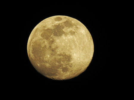 Waxing gibbous moon on a black background, with space for copy. The lit part of the moon increases until it gets to the full moon stage. -16の写真素材