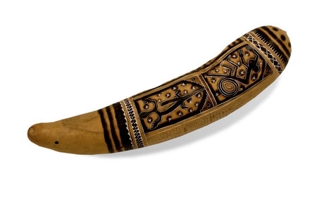 The African musical instrument from the dried pumpkin, covered by a list. On a white backgroundの写真素材