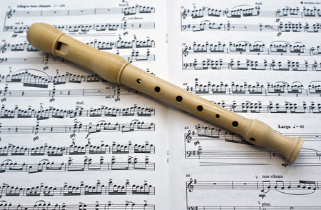 Flute on a musical paperの写真素材