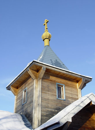 Wooden cross on a background of the sky. The north of Russia;                           の写真素材