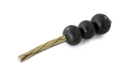 African percussion instrument from the dried up fruits. Over white
の写真素材