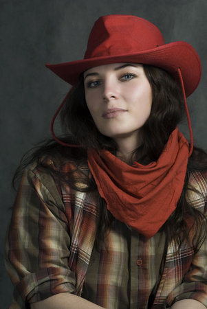 American cowgirl in a hat. Western movie styleの写真素材