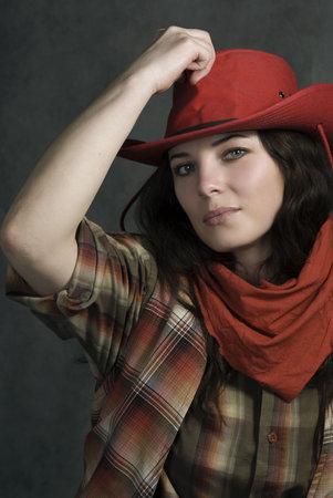 American cowgirl in a western movie styleの写真素材