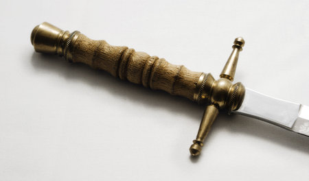 The ancient dagger isolated over whiteの写真素材